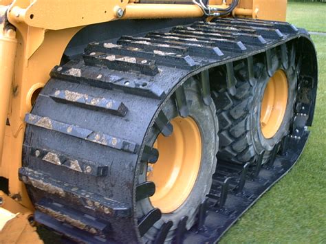 Patented open side plate provides excellent cleaning in the pivot area. . Over the tire skid steer tracks price